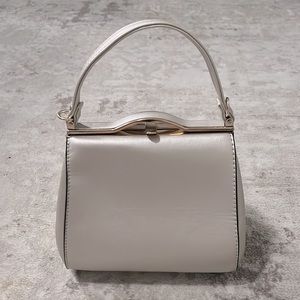 Beige/gold cross body.